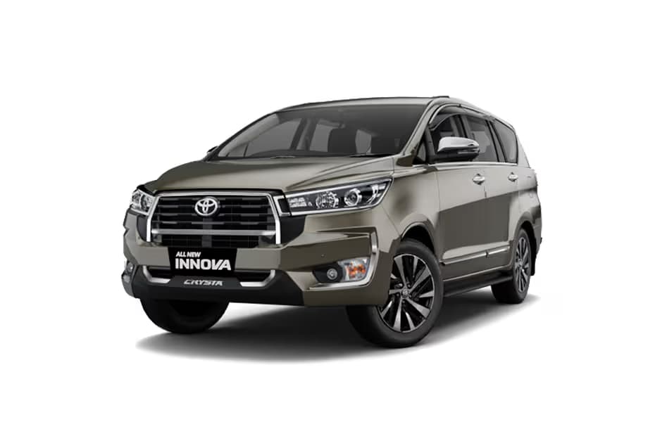 Toyota Innova Crysta 2.4 GX 7Str MUV Diesel car front three-quarter view India 2026 price mileage safety specs side by side car comparison vs Kia Carens AiCarAdvisor