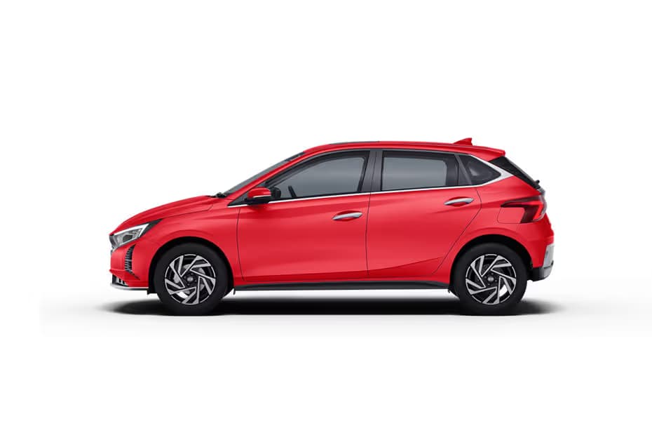 Hyundai i20 Era Hatchback Petrol car front three-quarter view India 2026 price mileage safety specs side by side car comparison vs Maruti Suzuki Baleno AiCarAdvisor